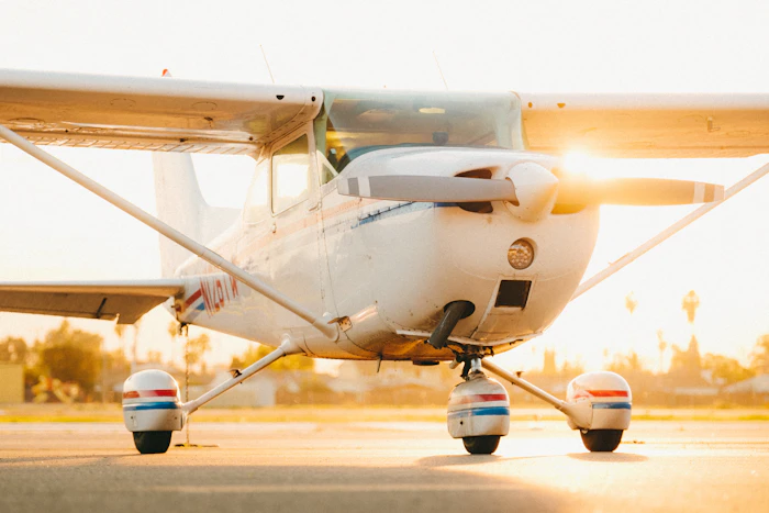 Training aircraft at sunrise