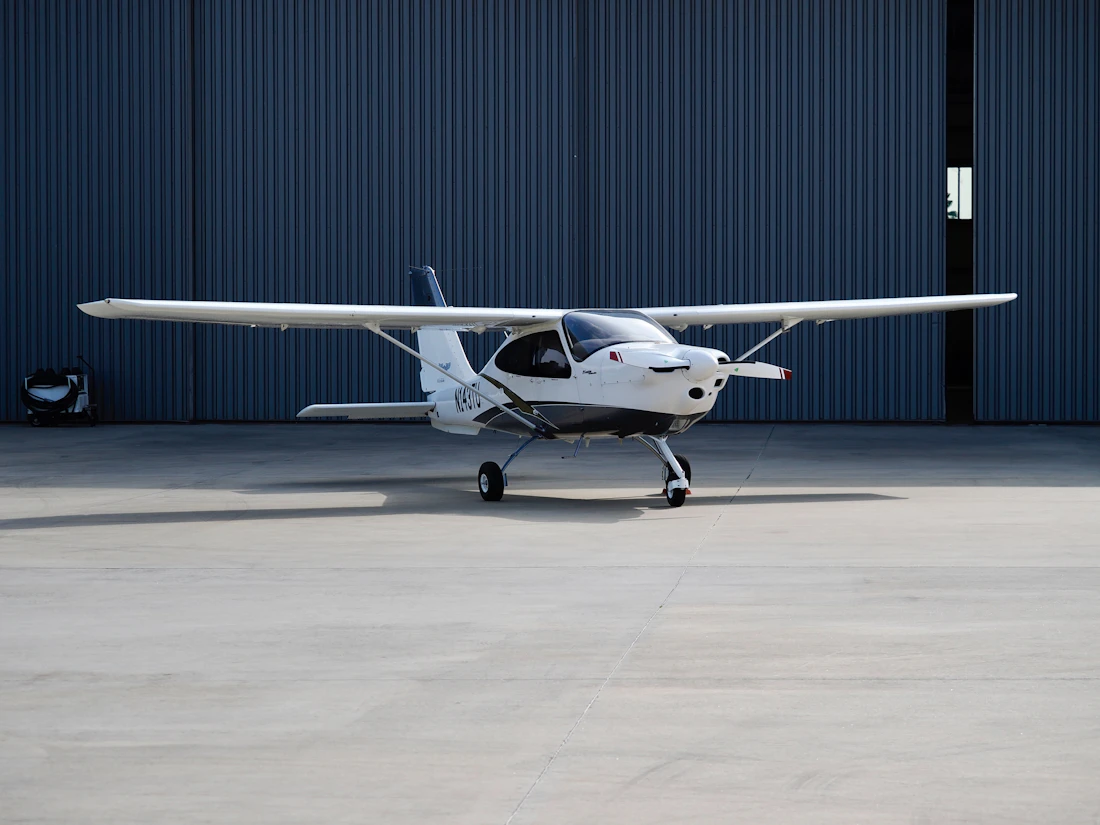 Training aircraft outside a hangar